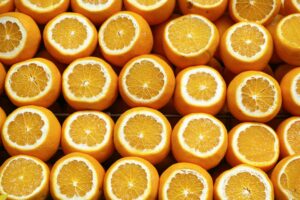 A vibrant array of freshly cut oranges showcasing their juicy interior. Perfect for healthy lifestyle themes.